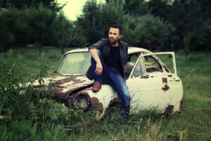 man, portrait, fashion, adult, style, men's fashion, old car, abandoned car, broken car, modeling, pose, posing, outdoors, nature, sitting, relaxed, classic car, old, car, car wallpapers, vintage, auto-815795.jpg